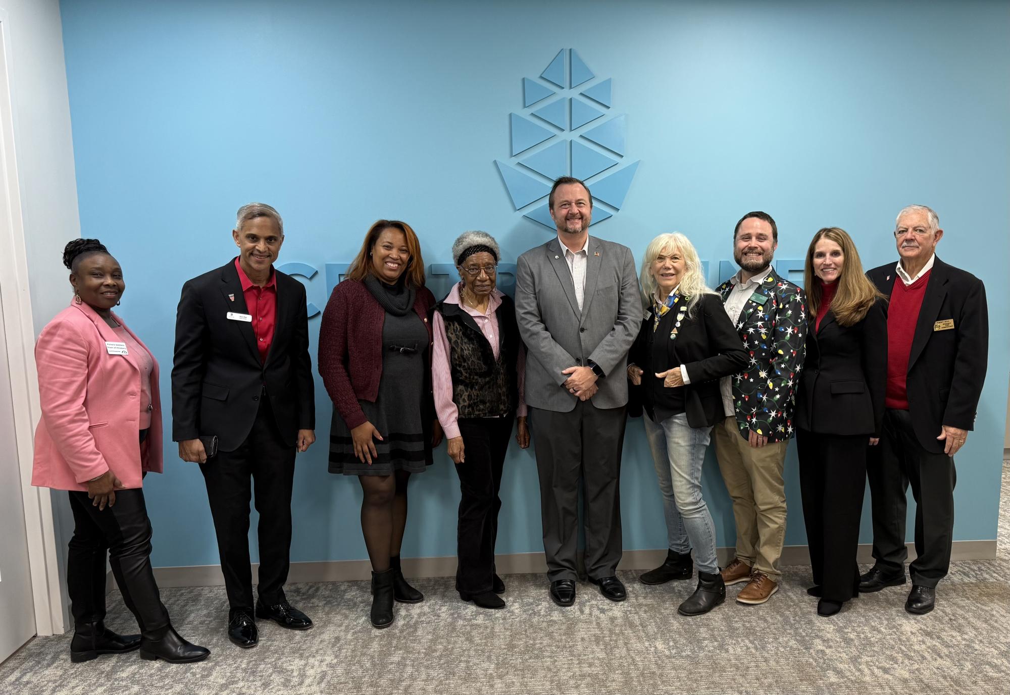 Group photo of Board Members rolling off