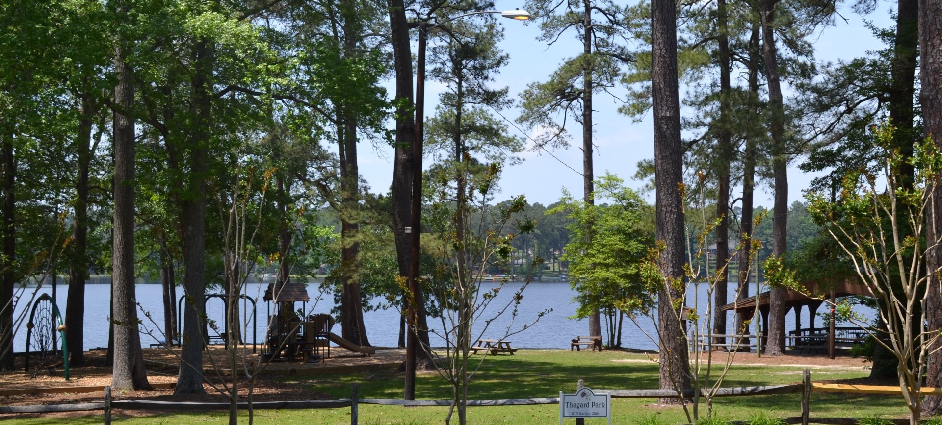 Park with lake at Whispering Pines